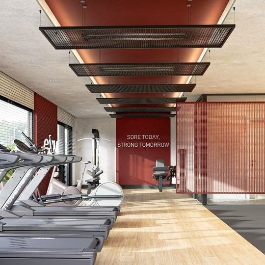 Modern gym interior featuring a stylish black and grey color scheme